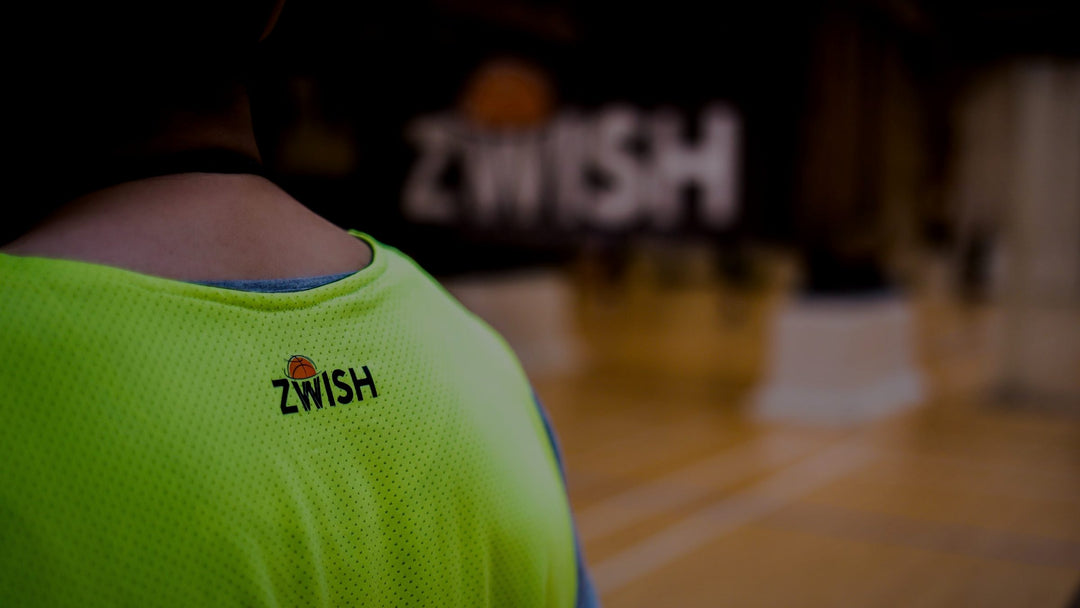 Neon green ZWISH training bib seen from behind